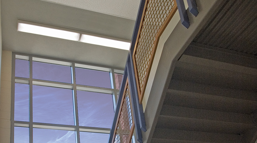 Healthcare stairwell featuring MLHA8 light fixtures